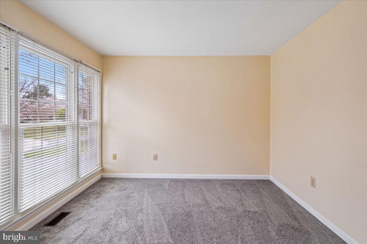 8010 Craddock Road Greenbelt, MD 20770 - Photo 8 of 49 a view of an empty room