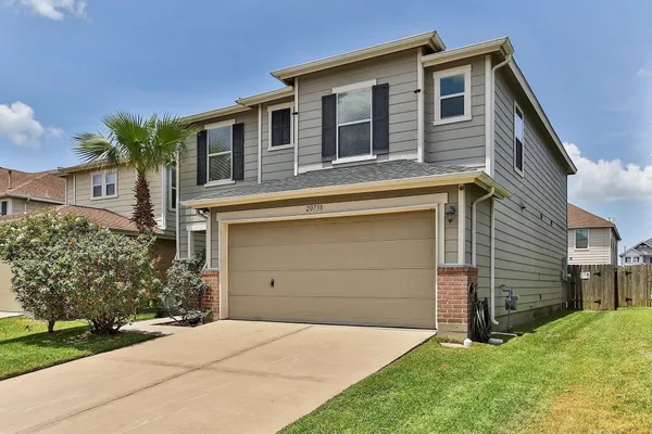 a front view of house with yard