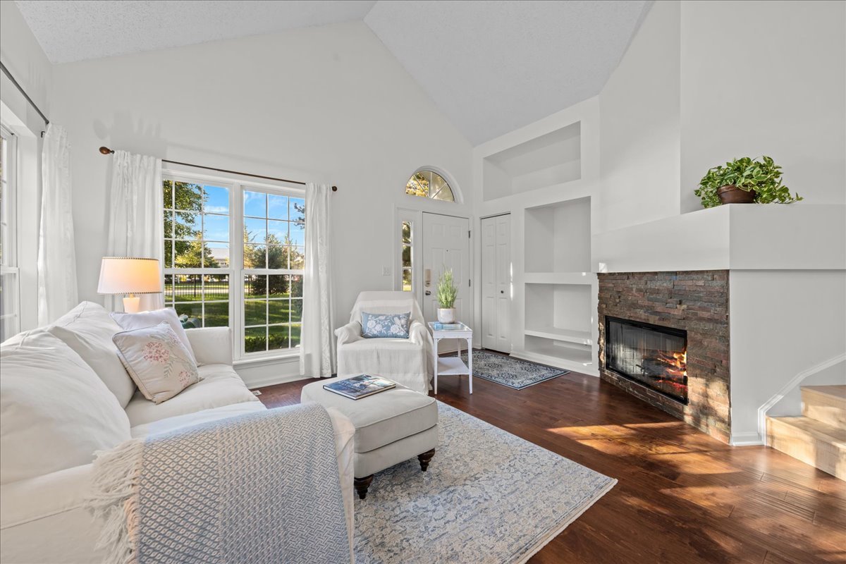 1320 Georgetown Drive Batavia, IL 60510 - Photo 3 of 21 a living room with furniture and a fireplace