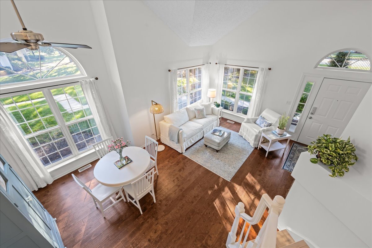 1320 Georgetown Drive Batavia, IL 60510 - Photo 7 of 21 a living room with furniture and a table