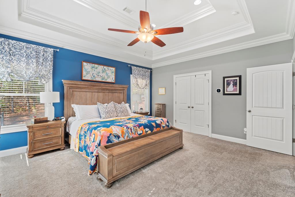 2800 Hopewell Church Road Pine Mountain, GA 31822 - Photo 22 of 39 a bedroom with a bed and a chandelier