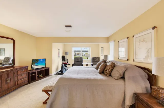 a bedroom with a bed and furniture