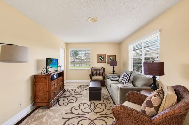 a living room with furniture or couch and a window