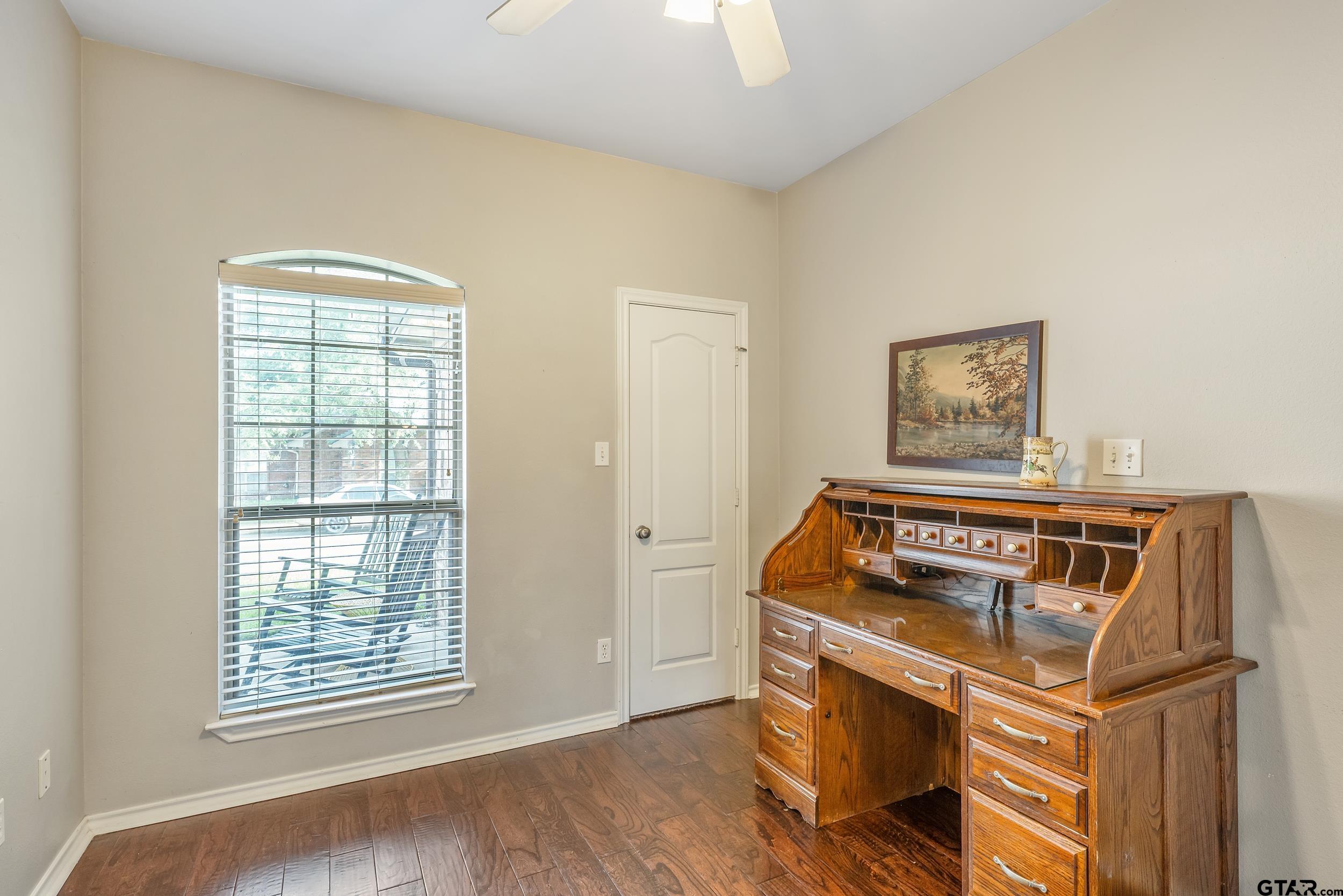 10820 Cactus Trail Flint, TX 75762 - Photo 12 of 29 a living room with storage and utility