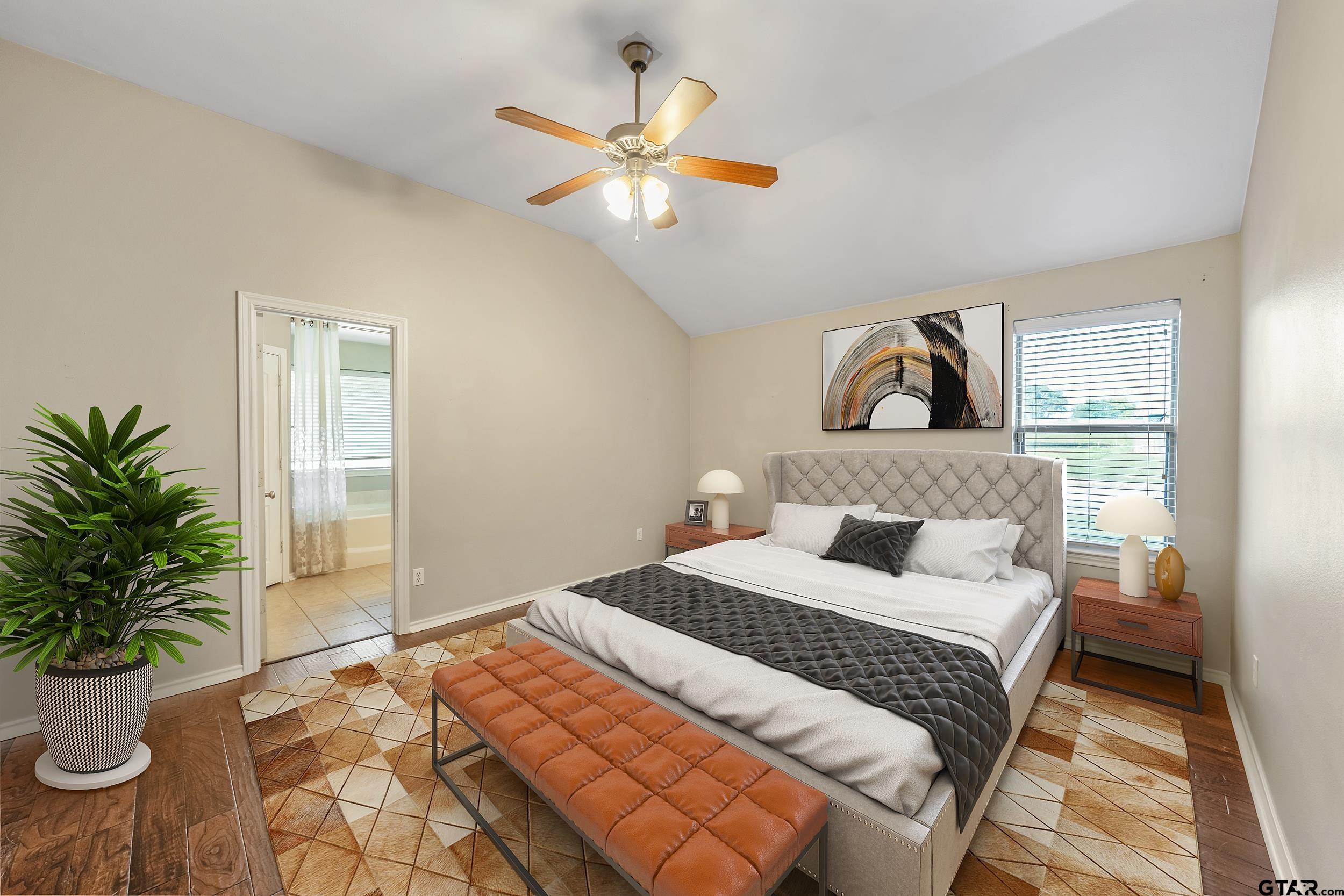 10820 Cactus Trail Flint, TX 75762 - Photo 15 of 29 a bedroom with a large bed and a window