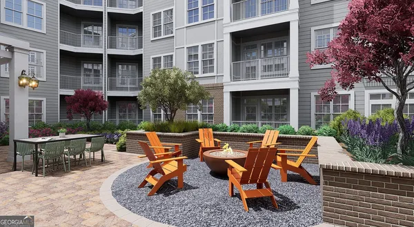 a backyard of a house with outdoor seating