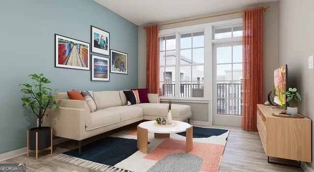a living room with furniture a table and a potted plant