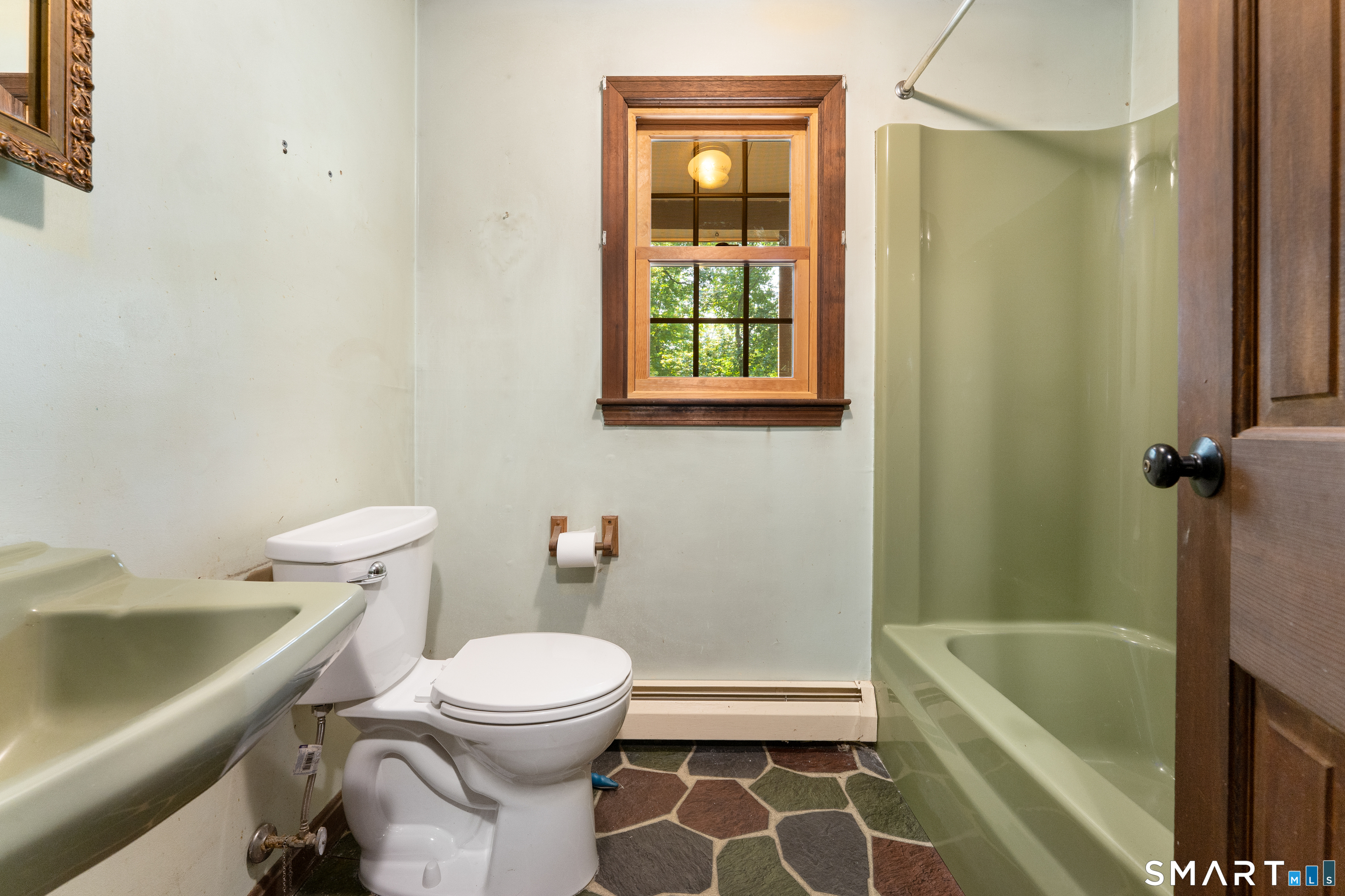 35 Pigeon Swamp Road, Unit 2 Lebanon, CT 06249 - Photo 31 of 35 a bathroom with a toilet a sink and bathtub