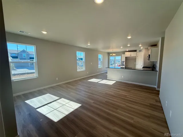 a view of livingroom with furniture and wooden floor