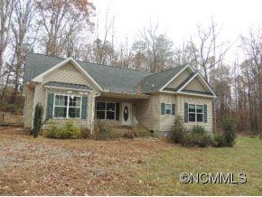 100 Hunter's Trail Tryon, NC 28782 - Photo 1 of 10 a view of front of house with a yard