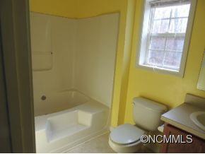 100 Hunter's Trail Tryon, NC 28782 - Photo 6 of 10 a bathroom with a shower