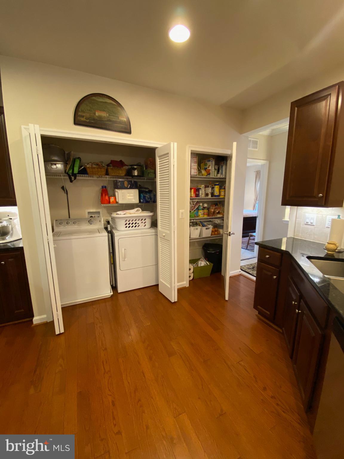 8420 Ice Crystal Drive, Unit M Laurel, MD 20723 - Photo 20 of 58 Laundry and Pantry in Kitchen