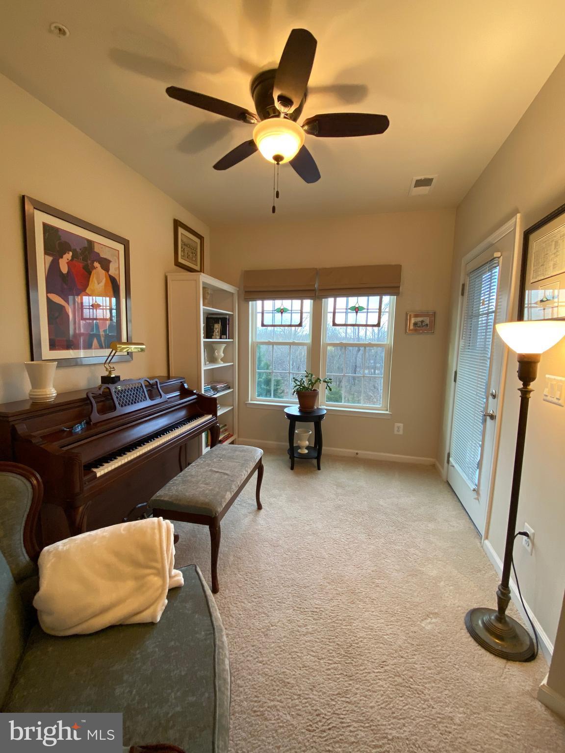 8420 Ice Crystal Drive, Unit M Laurel, MD 20723 - Photo 34 of 58 Bright Sunroom