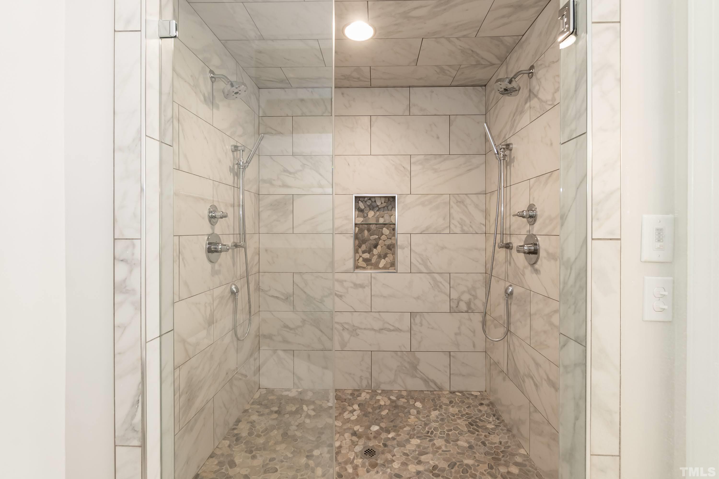 2215 Umstead Road Durham, NC 27712 - Photo 31 of 63 a bathroom with a shower