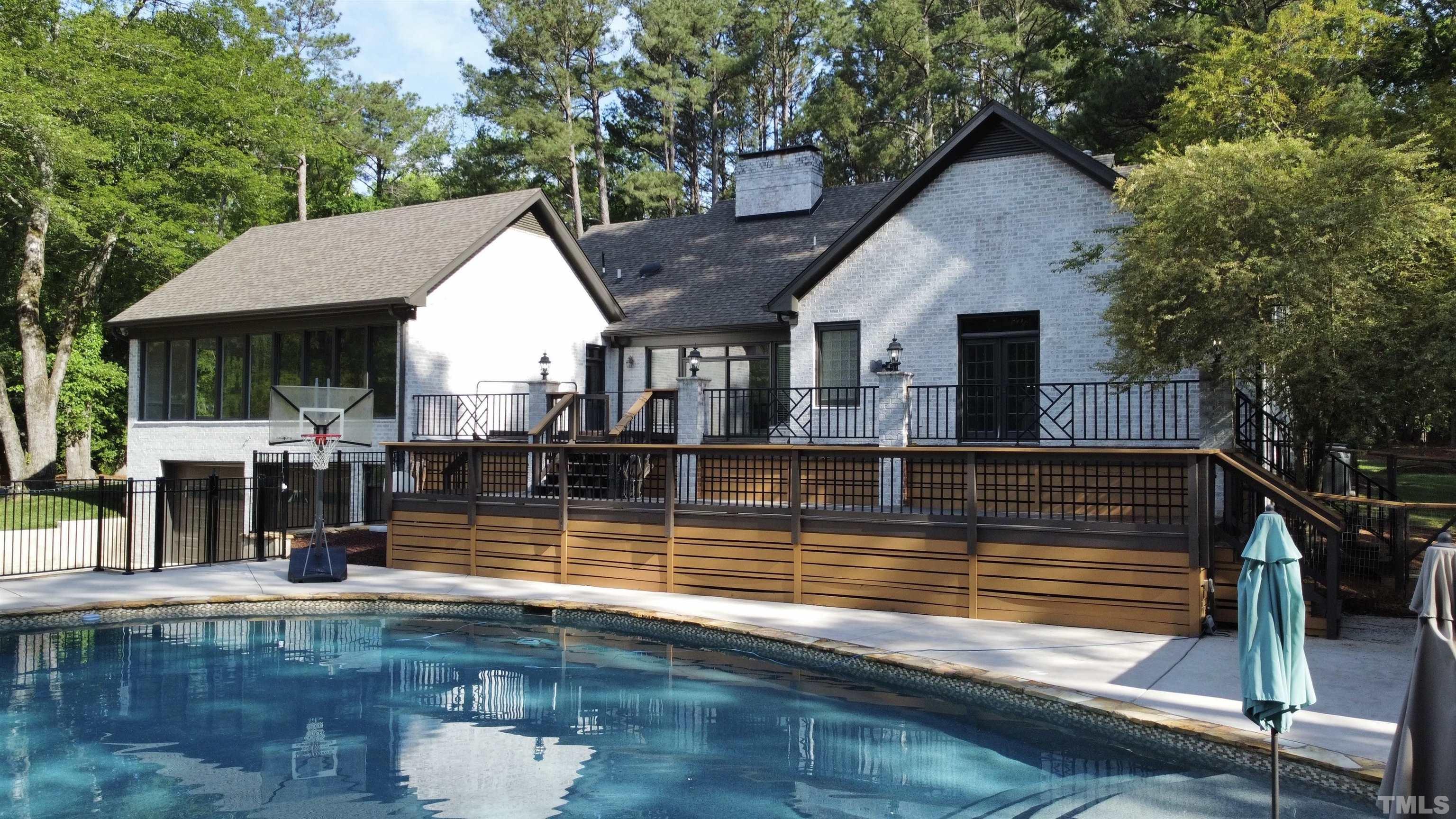 2215 Umstead Road Durham, NC 27712 - Photo 45 of 63 a view of a house with pool
