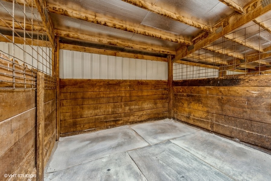 1S866 Green Road Elburn, IL 60119 - Photo 46 of 55 a view of a garage with wooden walls