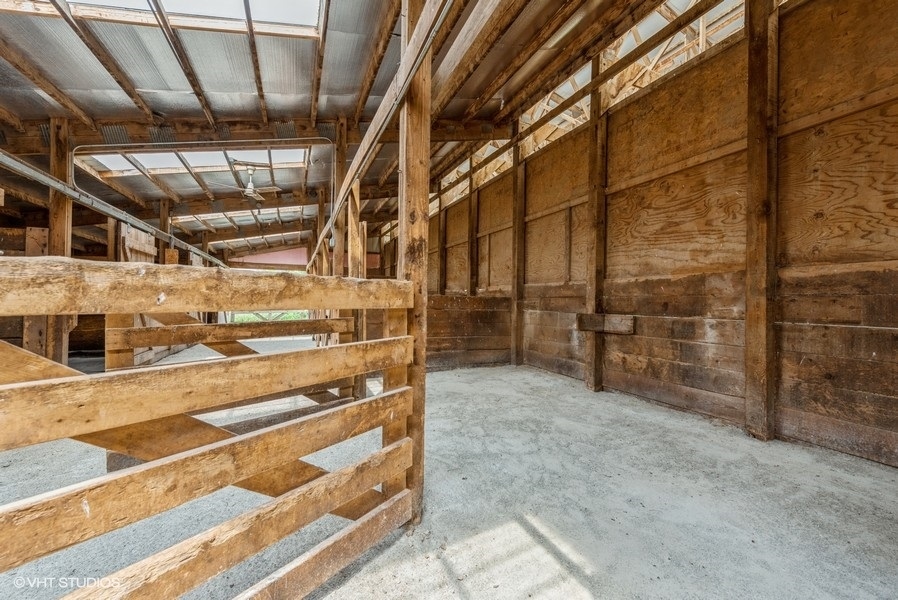 1S866 Green Road Elburn, IL 60119 - Photo 47 of 55 a view of an empty room with wooden floor