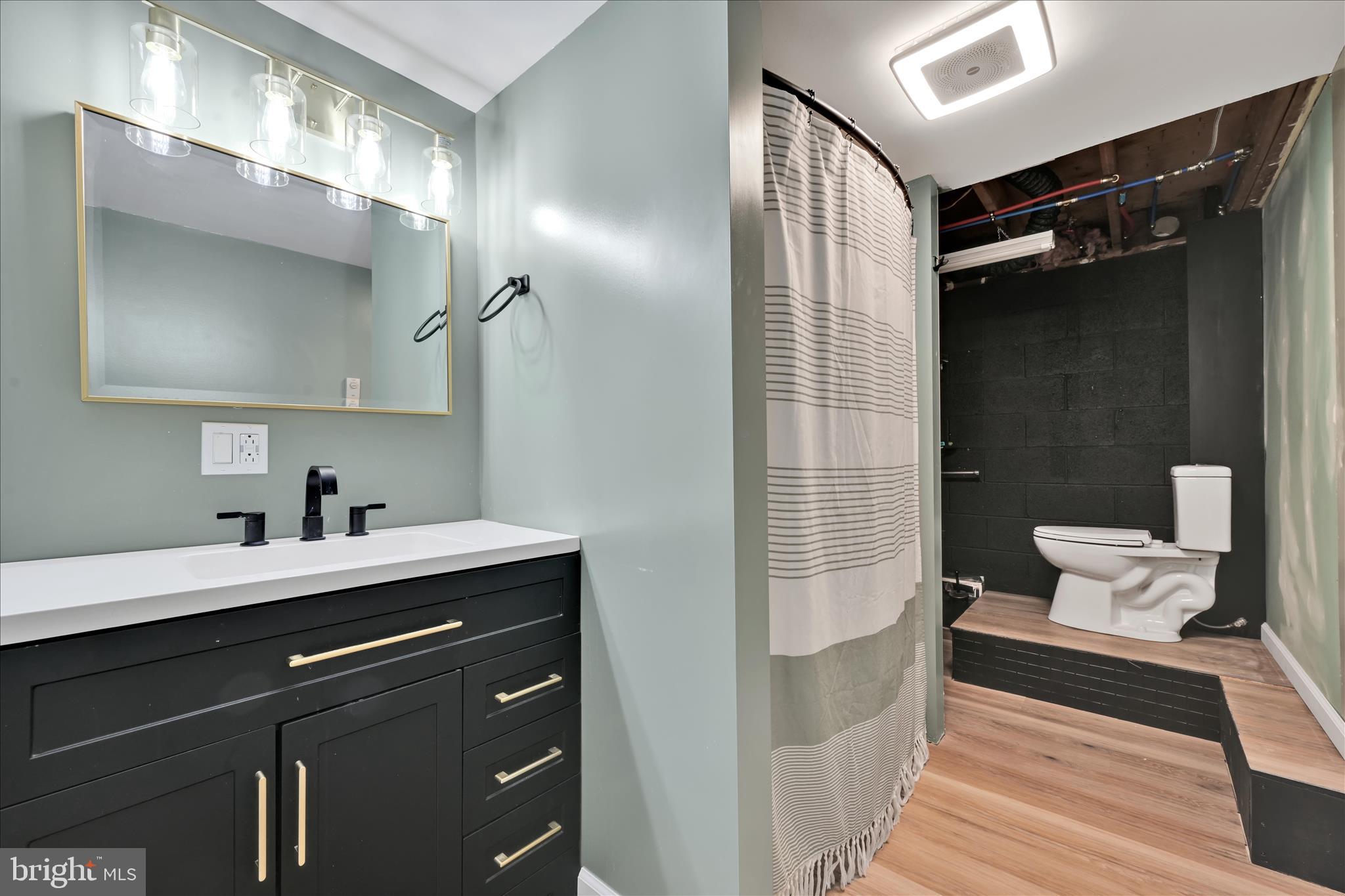 40 Long Stretch Road Pine Grove, PA 17963 - Photo 22 of 37 a en suite bathroom with a sink double vanity and a mirror
