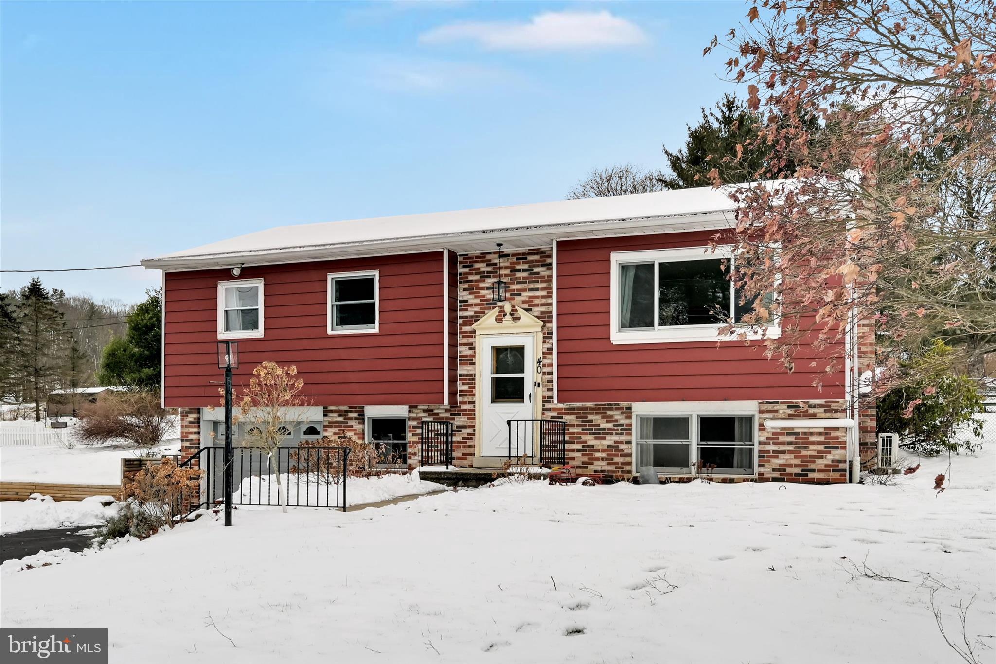 40 Long Stretch Road Pine Grove, PA 17963 - Photo 7 of 37 a front view of a house with a yard