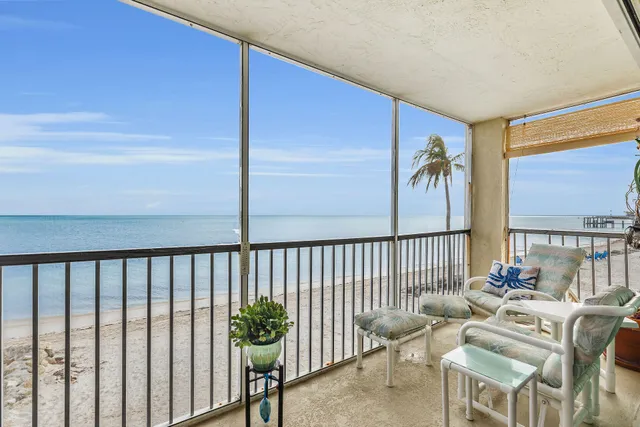 a balcony with furniture