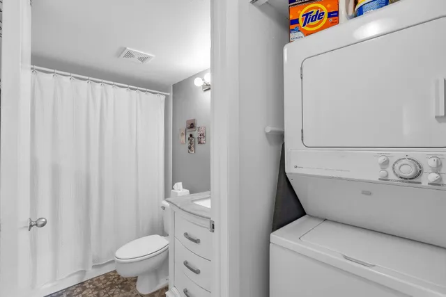 a bathroom with a toilet and a sink