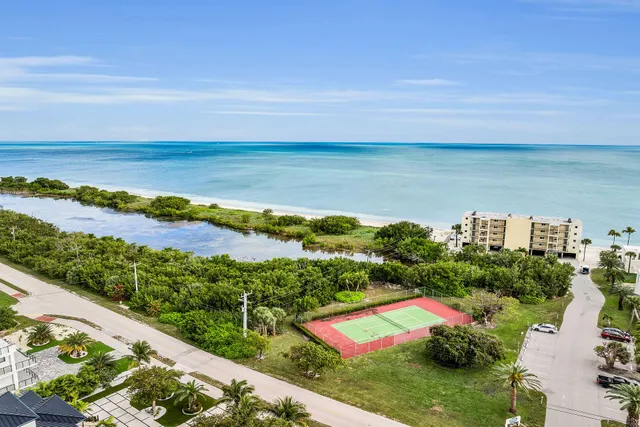 a view of an ocean and city