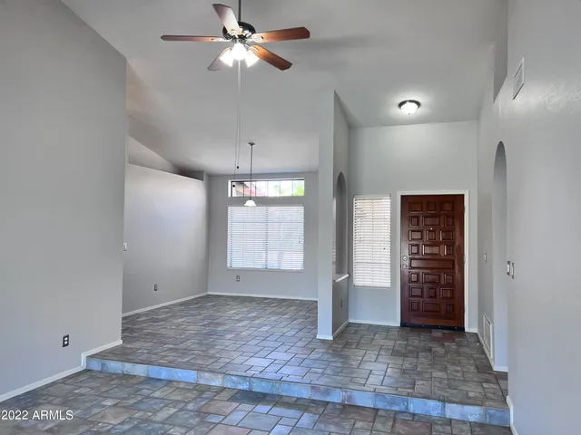 a view of an empty room and window