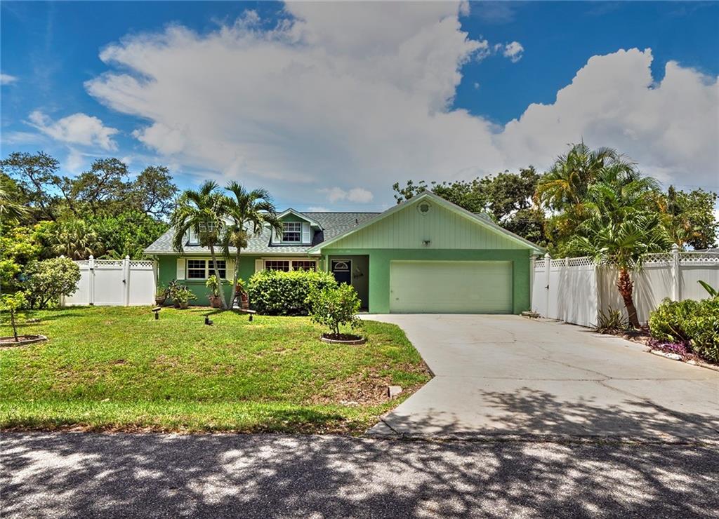 150 Bahama Road Venice, FL 34293 - Photo 1 of 1 a front view of a house with a yard and garage