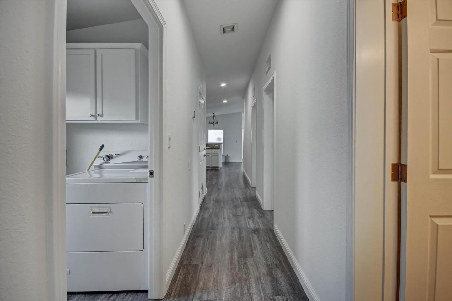 60 Wilson Way, Unit 117 Milpitas, CA 95035 - Photo 13 of 29 a view of hallway with wooden floor