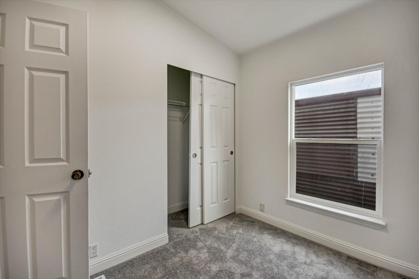 60 Wilson Way, Unit 117 Milpitas, CA 95035 - Photo 15 of 29 a view of an empty room with a window