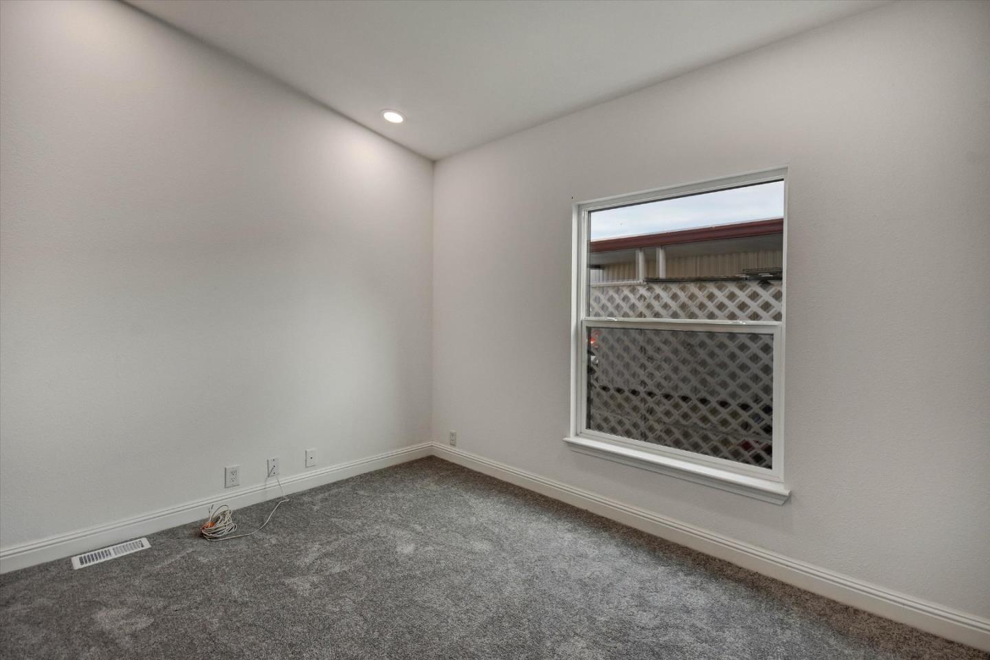 60 Wilson Way, Unit 117 Milpitas, CA 95035 - Photo 16 of 29 a view of an empty room with a window