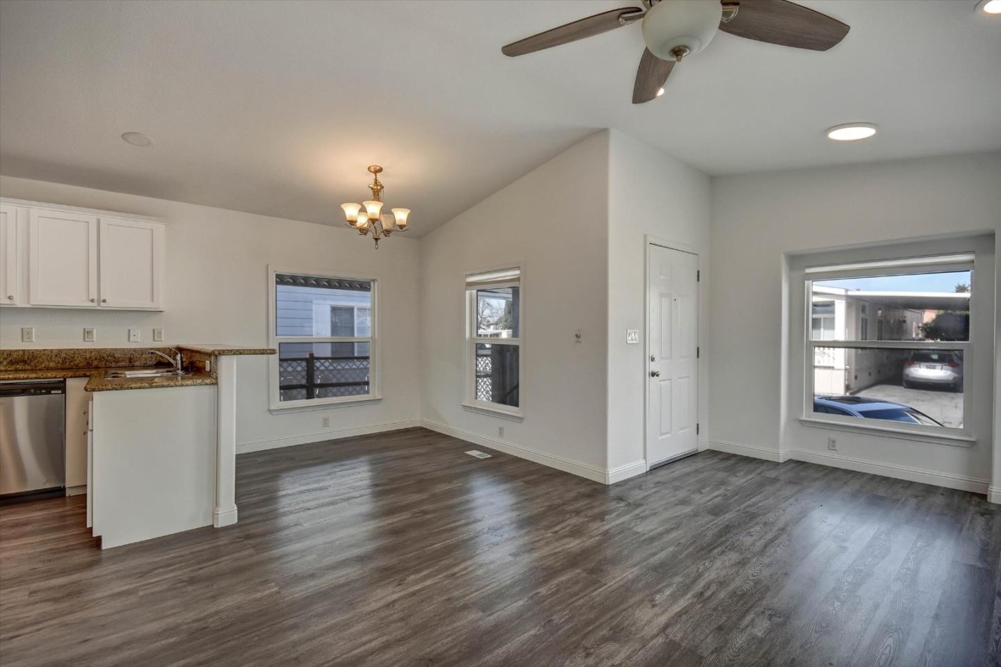 60 Wilson Way, Unit 117 Milpitas, CA 95035 - Photo 24 of 29 a view of a kitchen with wooden floor and a window