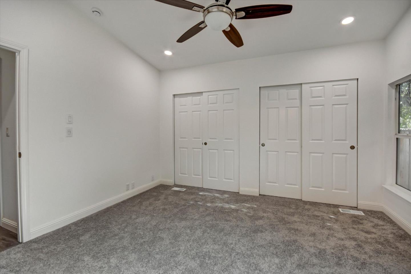 60 Wilson Way, Unit 117 Milpitas, CA 95035 - Photo 8 of 29 a view of a livingroom with a ceiling fan