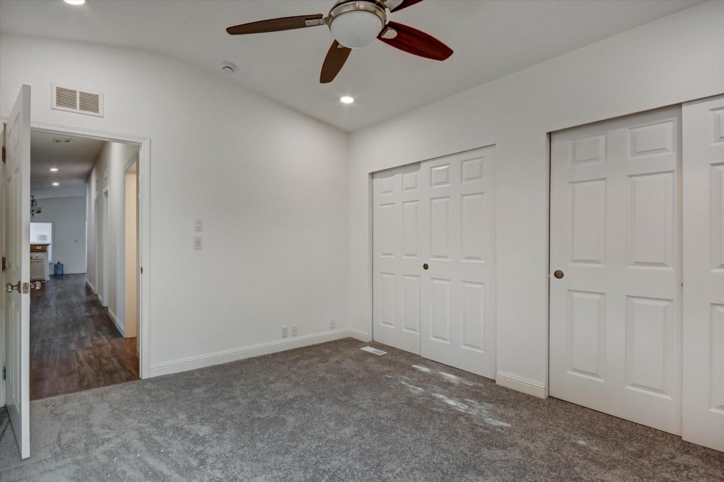 60 Wilson Way, Unit 117 Milpitas, CA 95035 - Photo 10 of 29 a view of a room with a ceiling fan