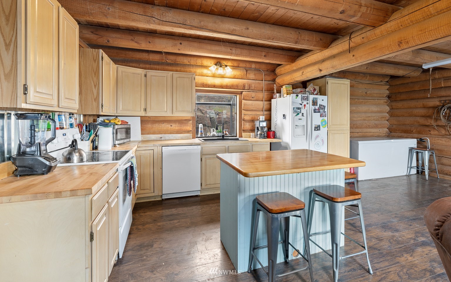 4301 Martin Road Northwest Ephrata, WA 98823 - Photo 15 of 40 a kitchen with stainless steel appliances granite countertop a sink and a refrigerator