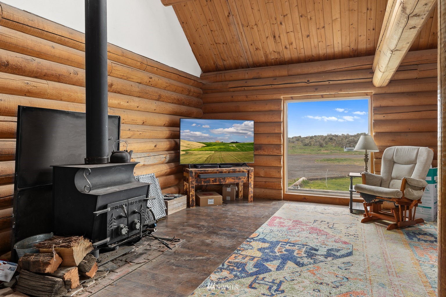 4301 Martin Road Northwest Ephrata, WA 98823 - Photo 17 of 40 a room with furniture and a flat screen tv