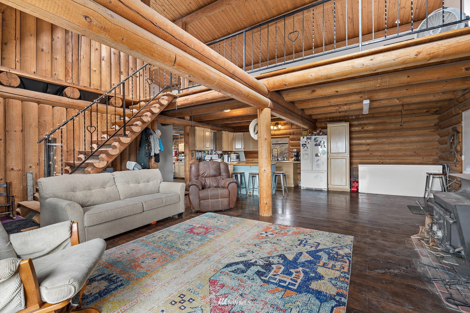 4301 Martin Road Northwest Ephrata, WA 98823 - Photo 18 of 40 a living room with furniture and a rug