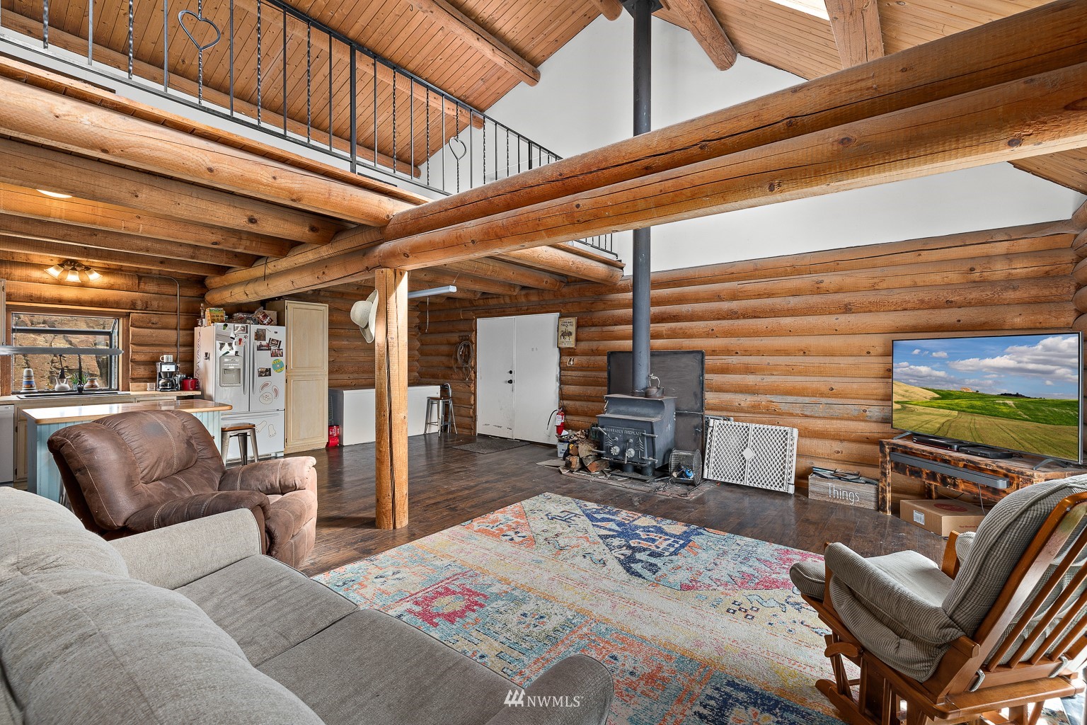 4301 Martin Road Northwest Ephrata, WA 98823 - Photo 20 of 40 a bedroom with furniture and a fireplace
