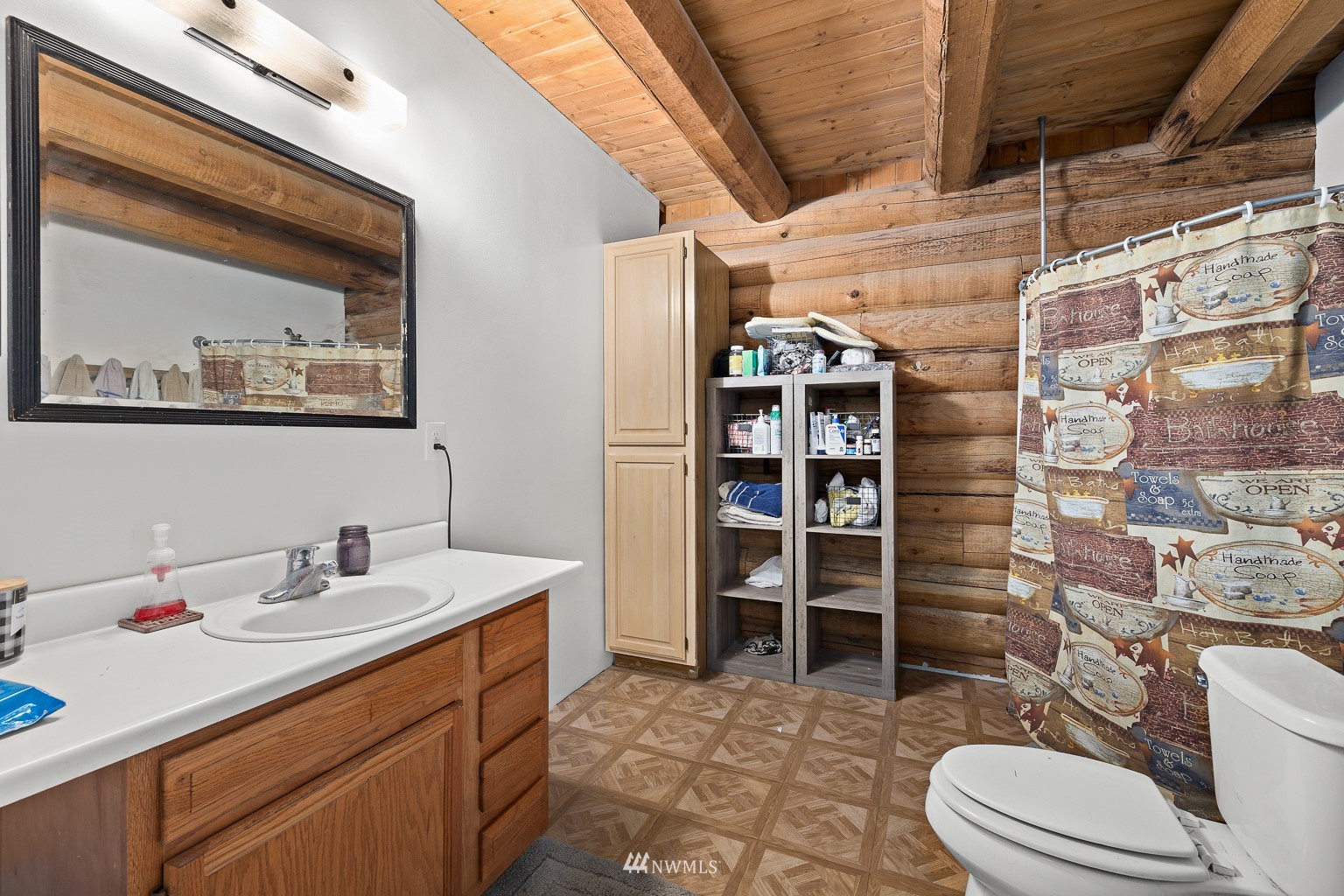 4301 Martin Road Northwest Ephrata, WA 98823 - Photo 21 of 40 a bathroom with a sink a toilet and shower