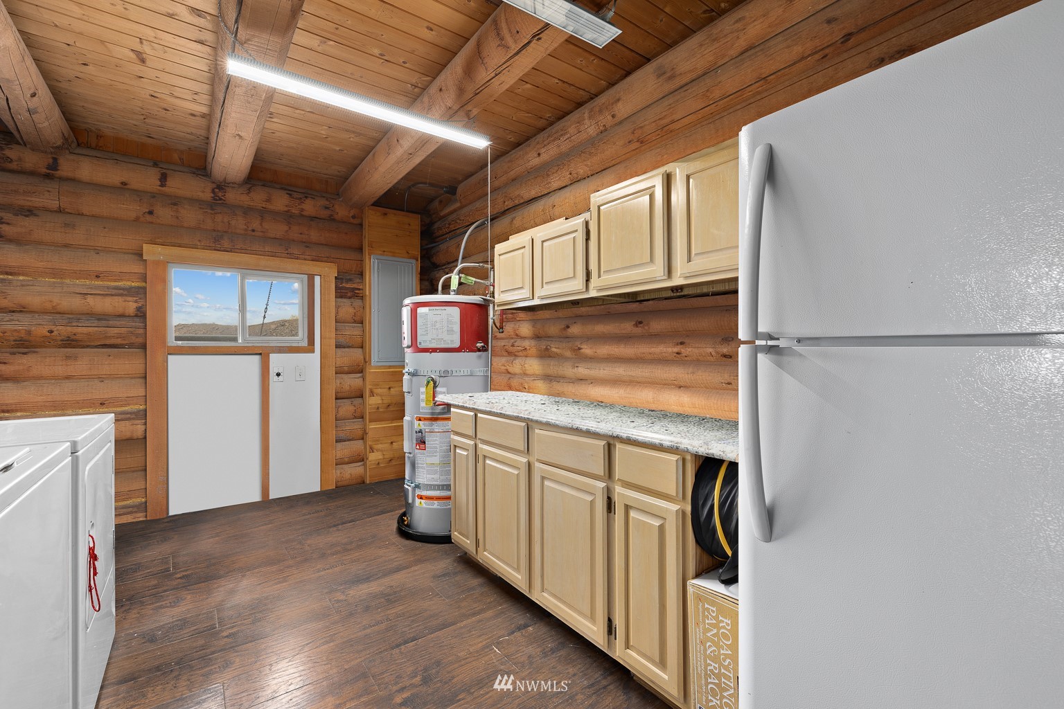 4301 Martin Road Northwest Ephrata, WA 98823 - Photo 28 of 40 a kitchen with a refrigerator and a stove