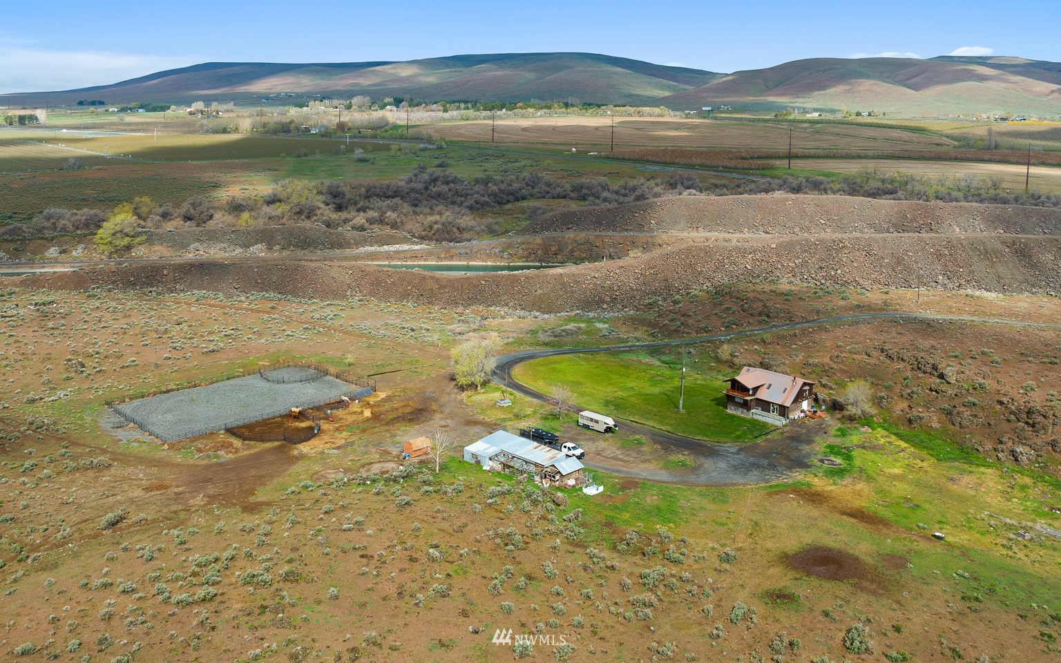 4301 Martin Road Northwest Ephrata, WA 98823 - Photo 8 of 40 a view of a lake with a mountain in the background