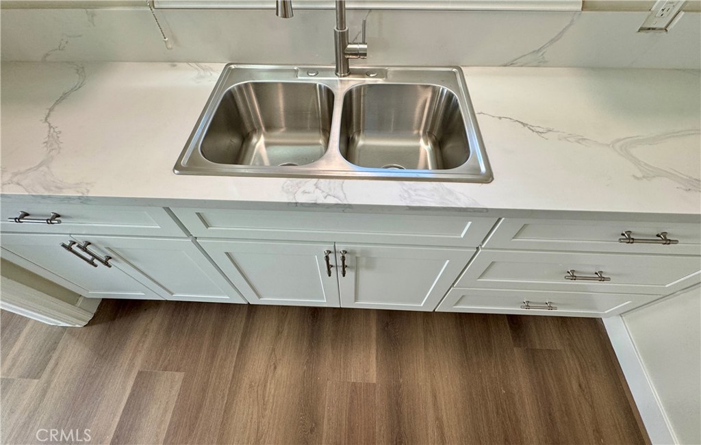 3402-3404 Gaviota Avenue, Unit B Long Beach, CA 90807 - Photo 6 of 20 a close view of sink and tap