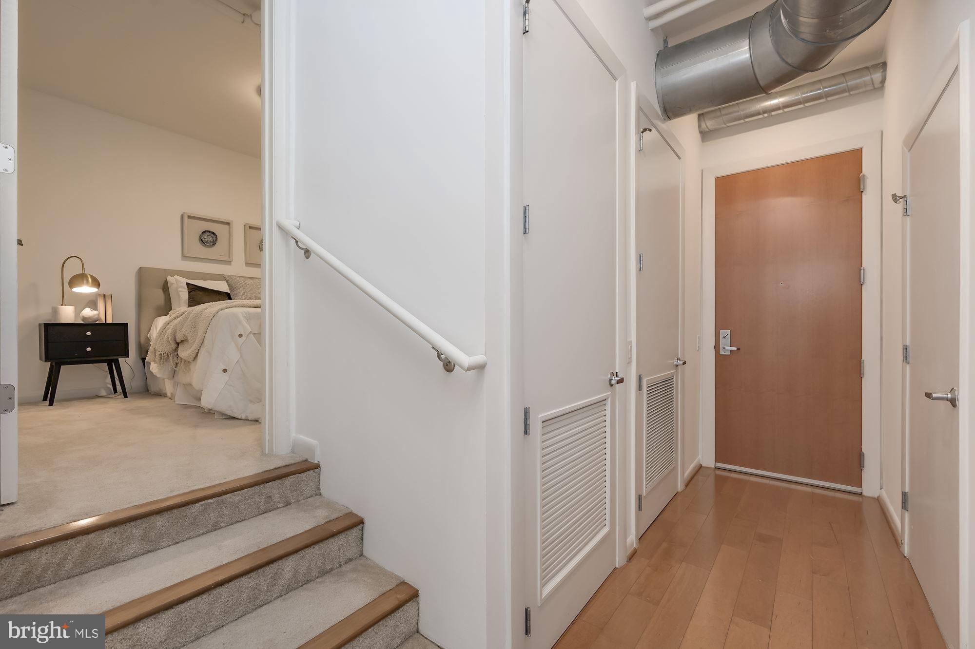 811 4th Street Northwest, Unit 219 Washington, DC 20001 - Photo 10 of 22 Foyer/Stairs to Bedroom 2