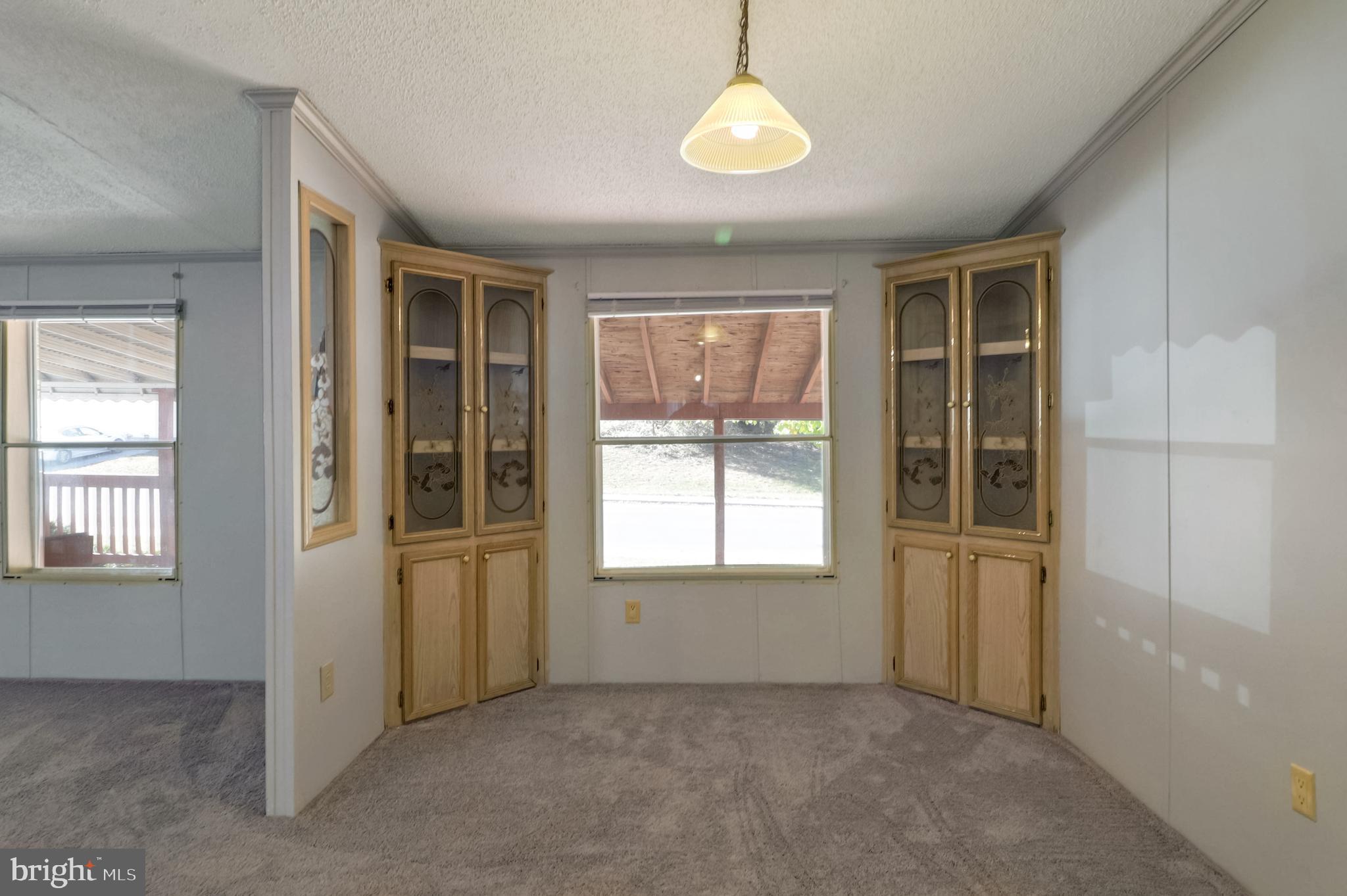 7810 Clark Road, Unit E15 Hanover, MD 21076 - Photo 10 of 20 an empty room with windows