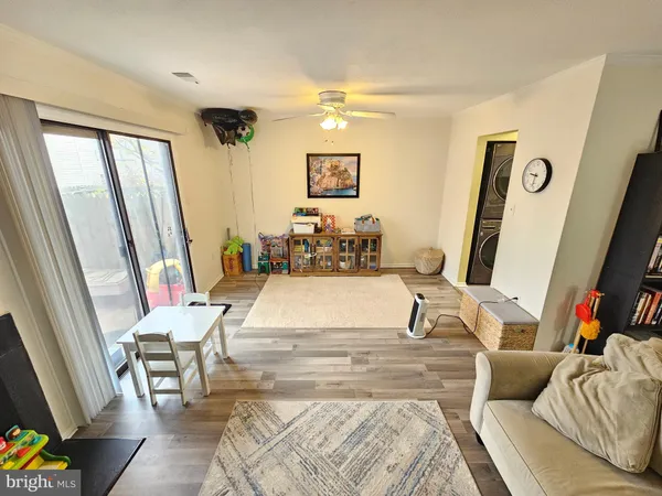a living room with couch and a view of living room