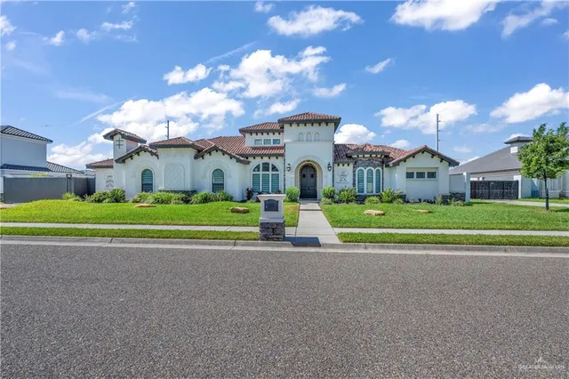 a view of yard with swimming pool and green space