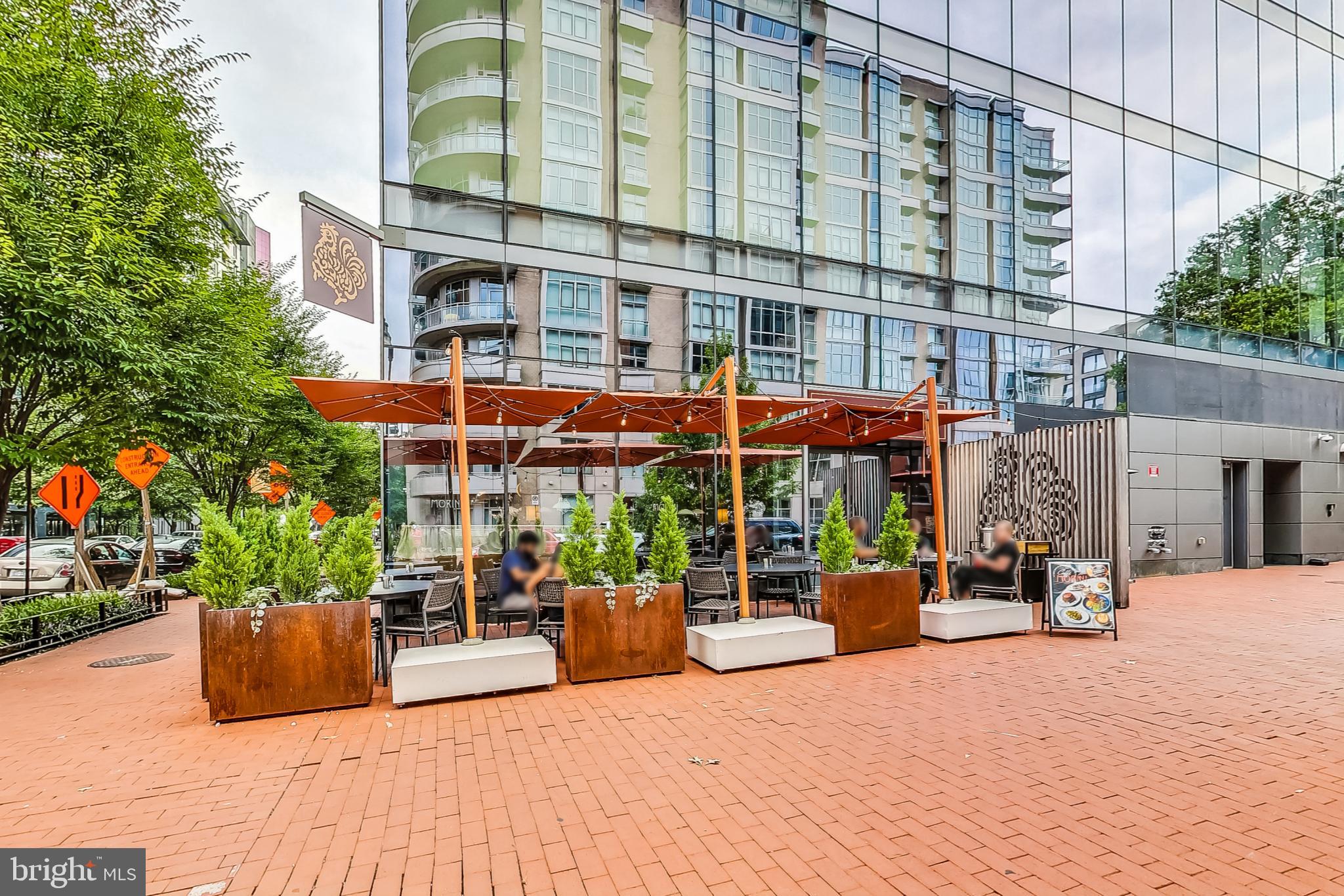 811 4th Street Northwest, Unit 112 Washington, DC 20001 - Photo 32 of 44 a view of a building with sitting area