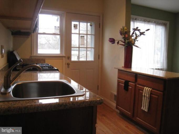 230 Riverthorn Road Middle River, MD 21220 - Photo 4 of 27 a close view of sink and mirror