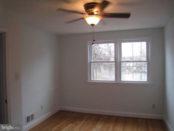 230 Riverthorn Road Middle River, MD 21220 - Photo 9 of 27 an empty room with a window