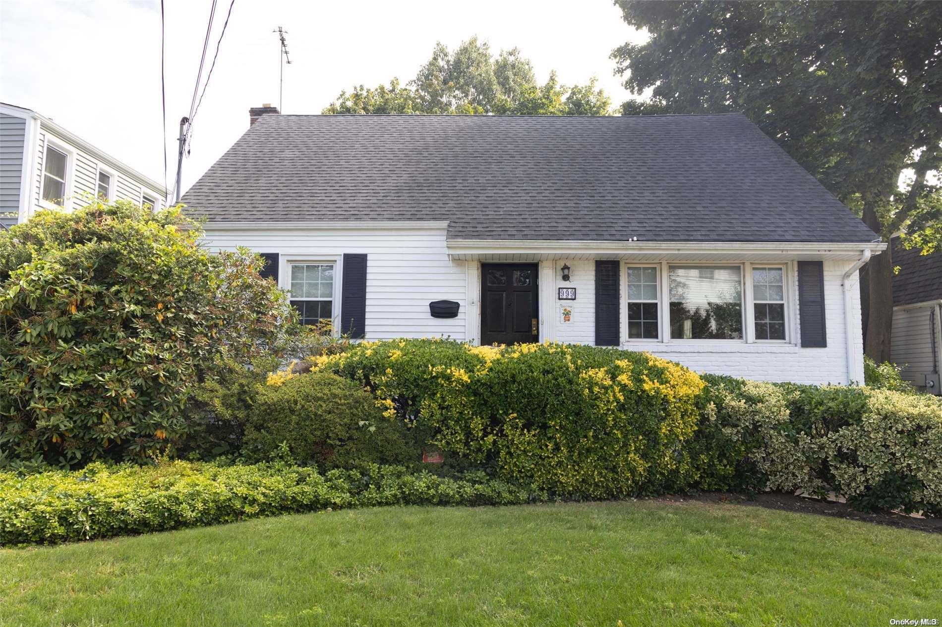 a view of a house with a garden